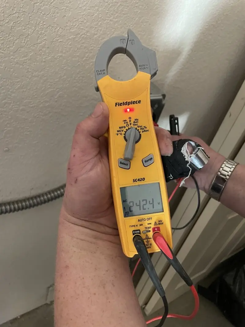 Voltage testing with clamp meter during Generator Installation in Hanover Park